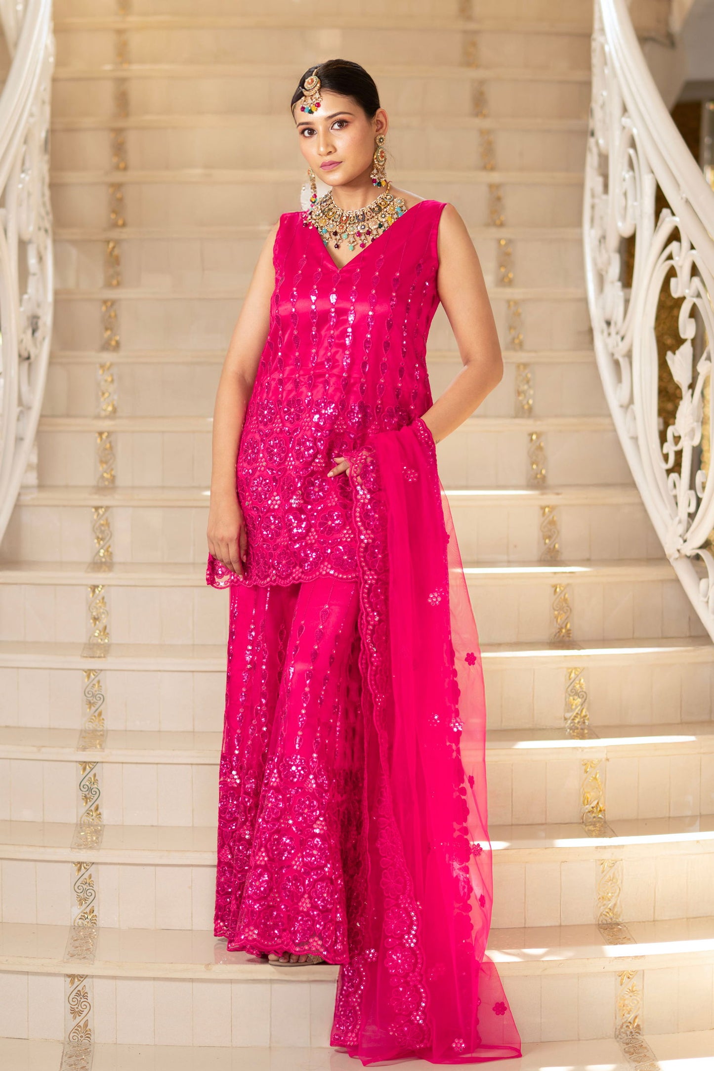 Fuchsia Pink Super Net Sleeveless Kurta with Flared Palazzo Set - Mayrake.in