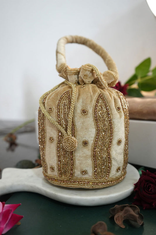 Beige Color Hanging Potli with Golden Beads and Zari Designs with Velvet Base - Mayrake.in