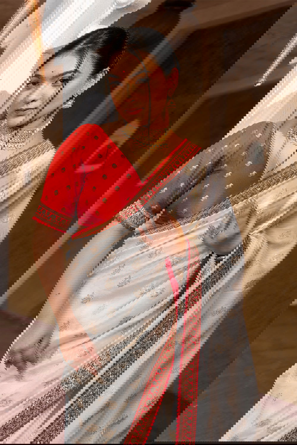 Cream Silk Saree with Golden Buti Work and Rich Red Zari Border - Mayrake.in