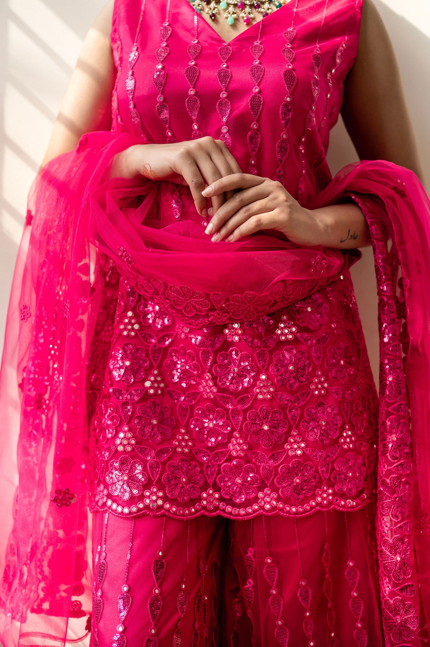 Fuchsia Pink Super Net Sleeveless Kurta with Flared Palazzo Set - Mayrake.in