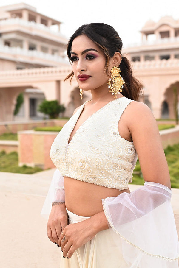 Gold Metal Paan-Shaped Earrings with Teardrop Pearls and Ghungroo Accents - Mayrake - 