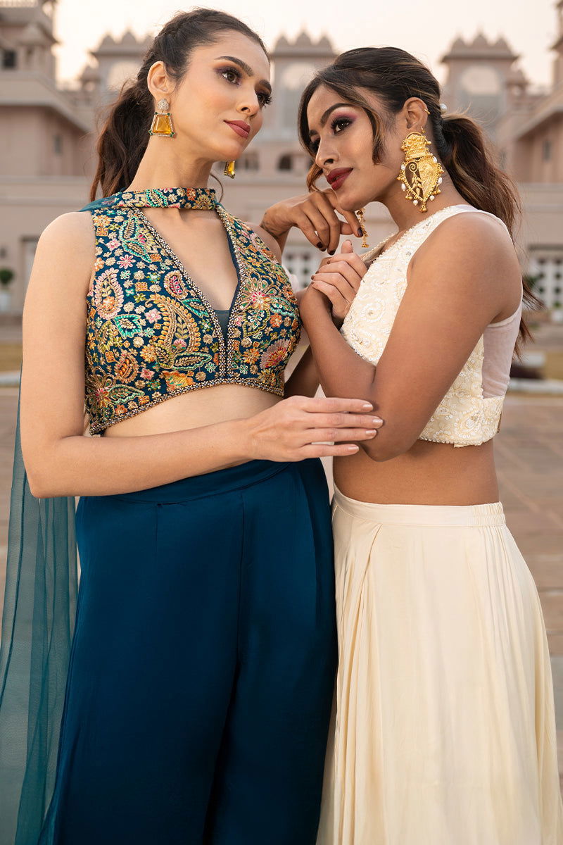 Gold Metal Paan-Shaped Teardrop Pearls Ghungroo Accents Earrings - Mayrake.in