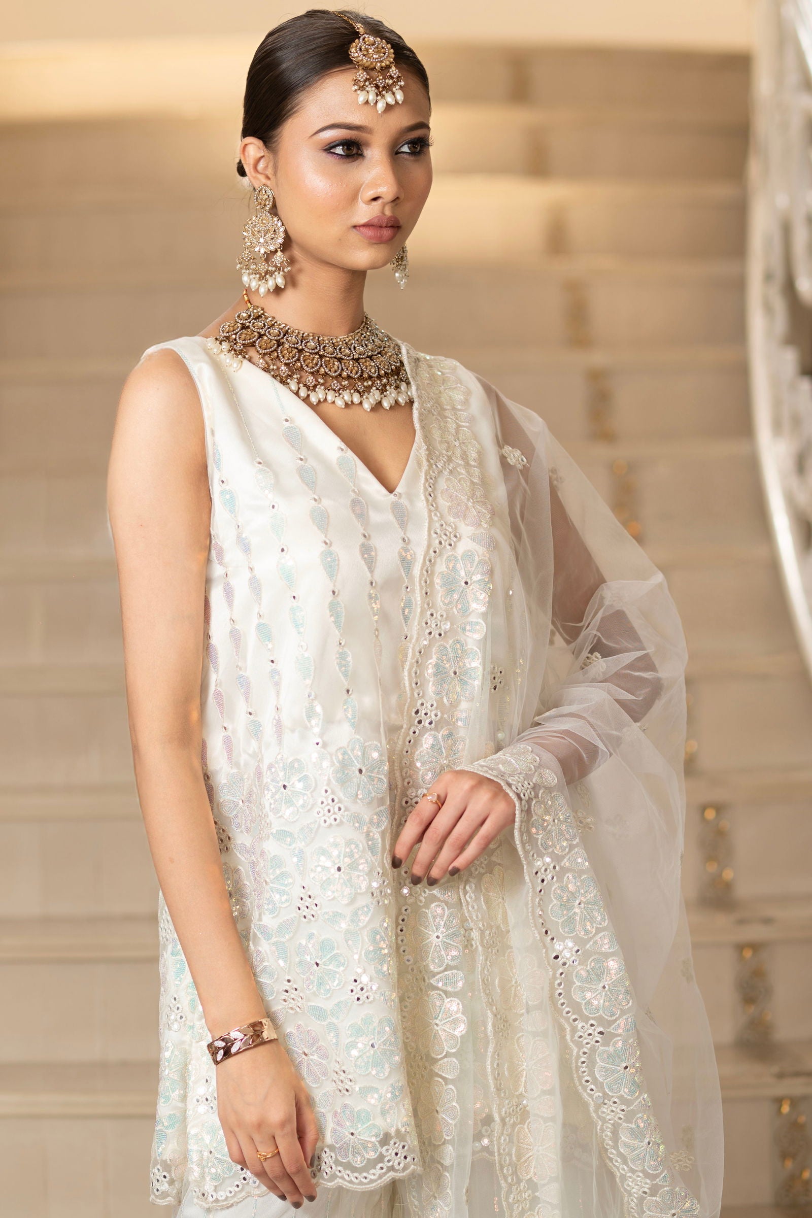 Ivory Pearl White Super Net Sleeveless  Kurta With Flared Palazzo Set - Mayrake.in