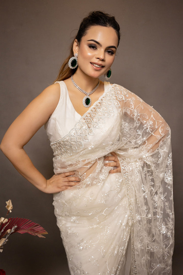 Ivory White Super Net Saree with thread Work, Swarovski Border, and Detailed Blouse - Mayrake