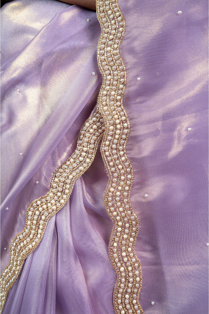Lavender purple Organza Shimmer saree with pearl and sequin border - Mayrake.in