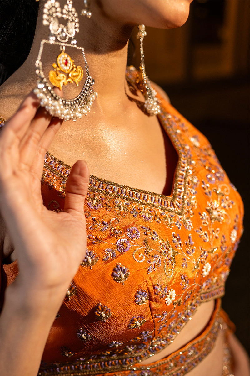 Orange Buti Skirt with Zardosi Crop Top and Matching Embroidered Contrast Dupatta - Mayrake.in
