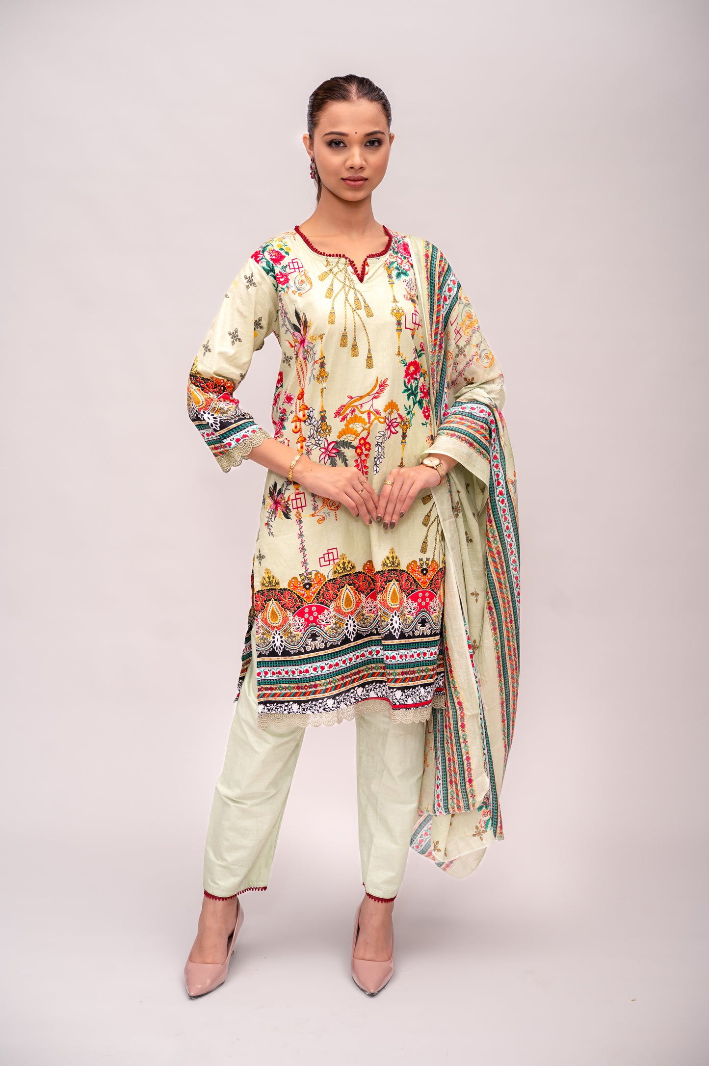 Pastel Green Cotton Suit with Embroidery with a Malmal Printed Dupatta
