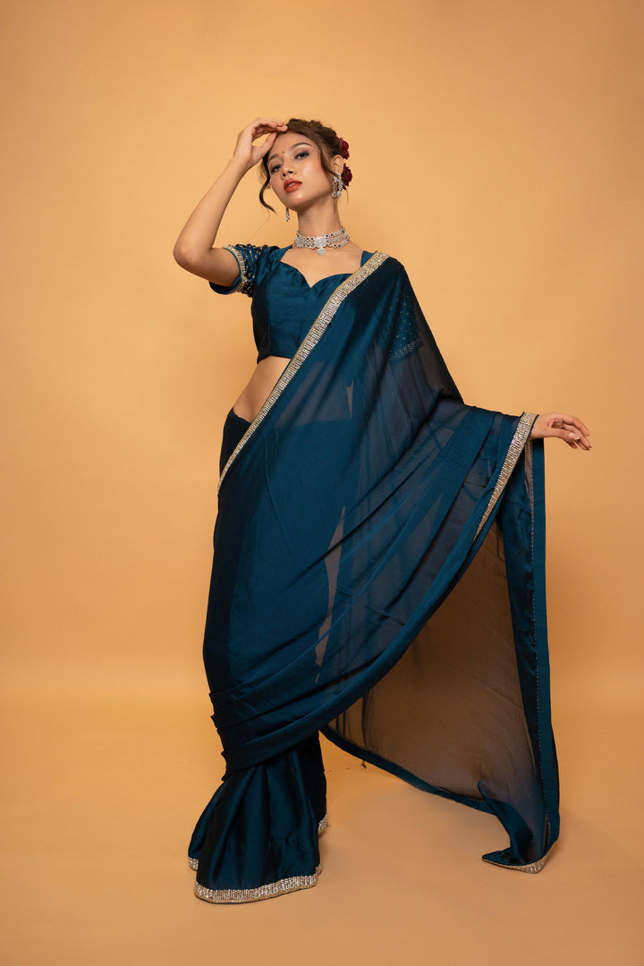 Peacock Blue Georgette Saree with Cutdana and Swarovski Work and Lace with a designer Blouse - Mayrake