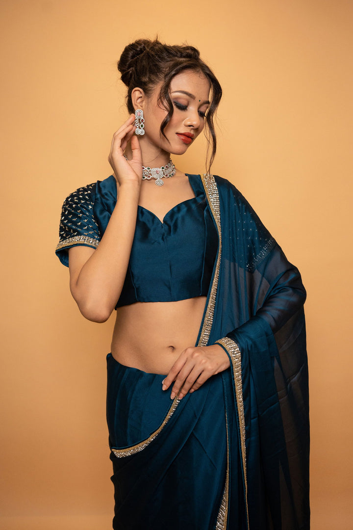 Peacock Blue Georgette Saree with Cutdana and Swarovski Work and Lace with a designer Blouse - Mayrake