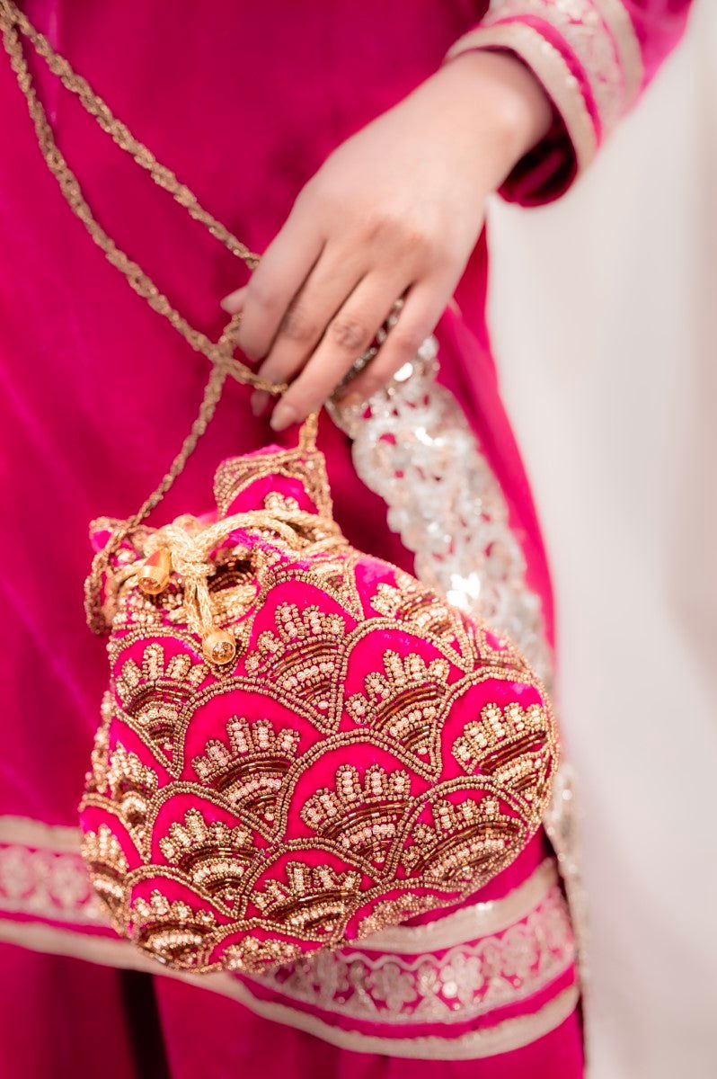 Rani Pink Potli with Beautiful Pipe and Bead Sequin Design - Mayrake.in