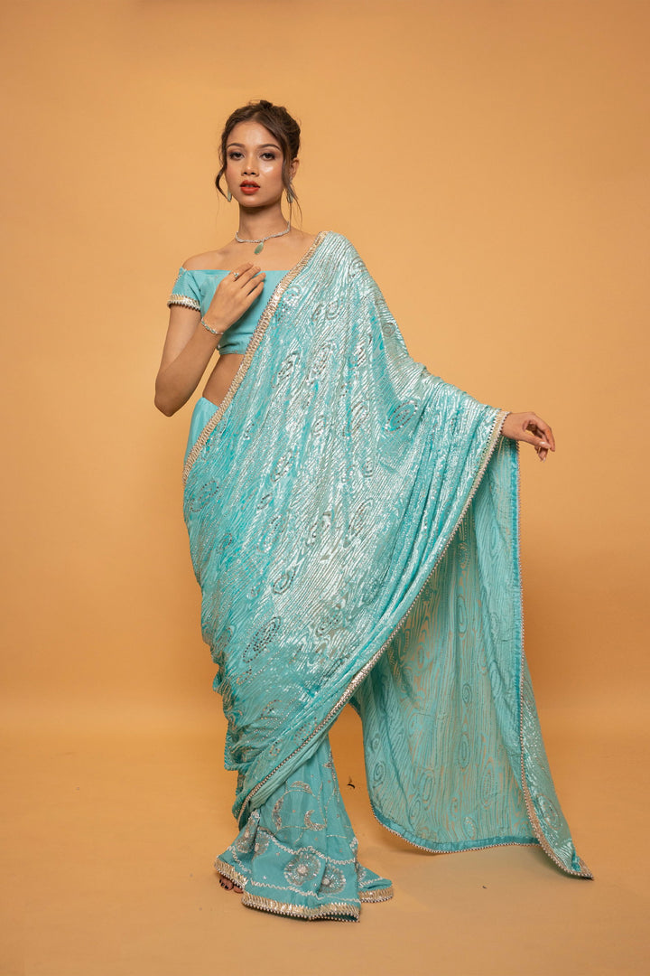 Sea Blue Saree with Luxurious Velvet Pallu, Gota Patti Border, and Sequin Work Paired with Stitched Designer Blouse - Mayrake