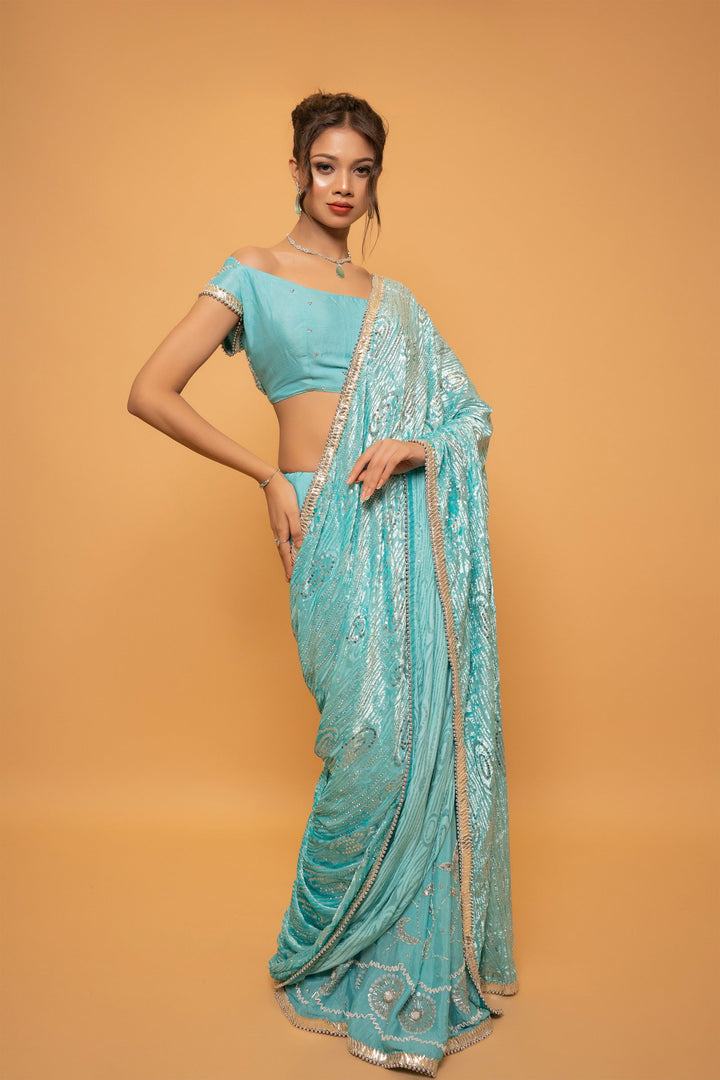 Sea Blue Saree with Luxurious Velvet Pallu, Gota Patti Border, and Sequin Work Paired with Stitched Designer Blouse - Mayrake