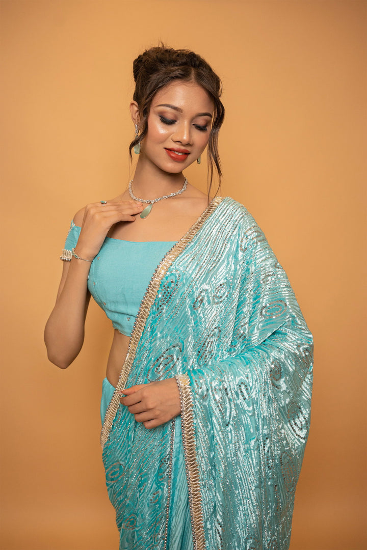 Sea Blue Saree with Luxurious Velvet Pallu, Gota Patti Border, and Sequin Work Paired with Stitched Designer Blouse - Mayrake
