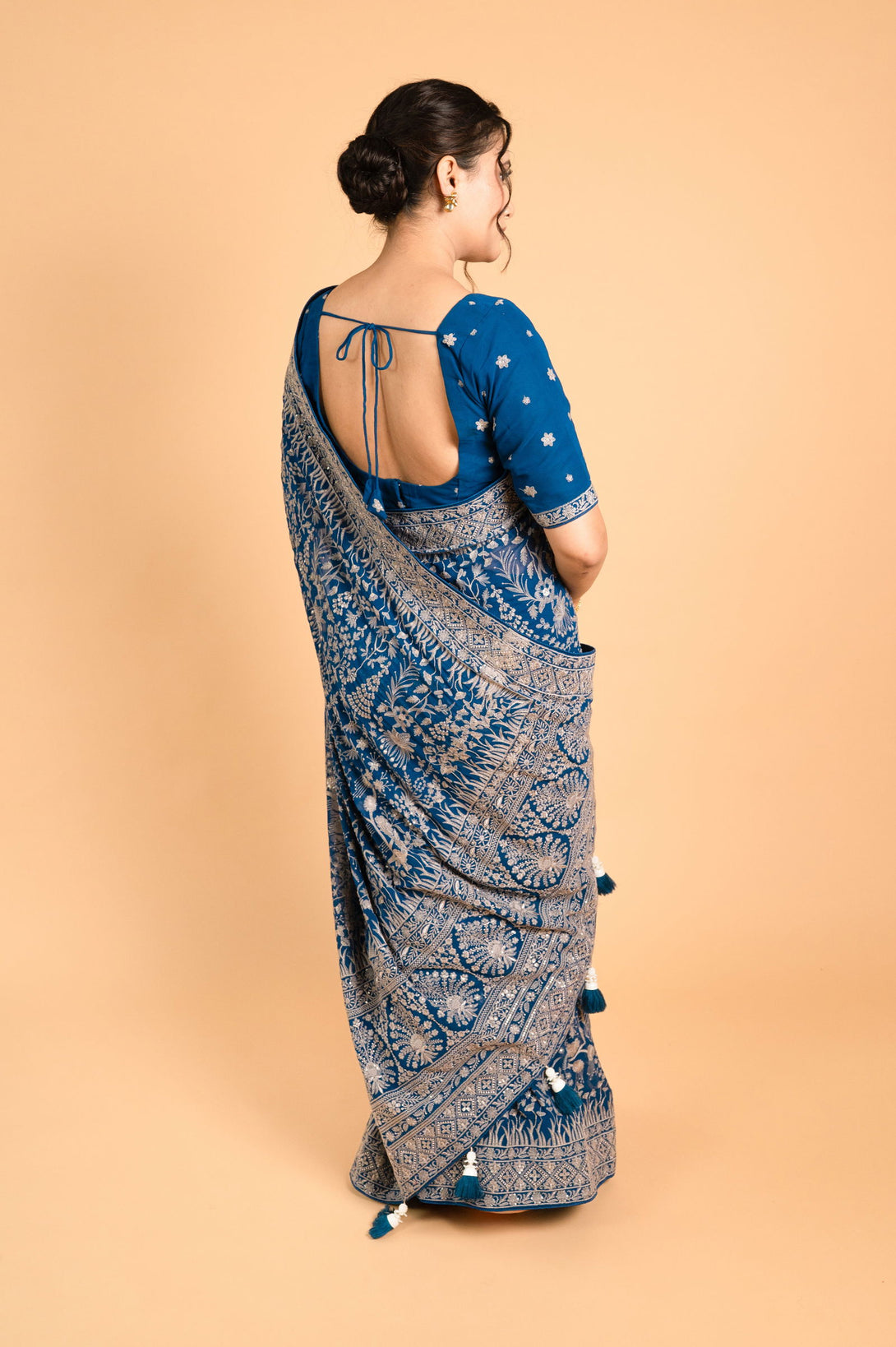 Teal Blue Lucknowi Georgette Saree with Beautiful Tassels and Zari Work - Mayrake.in